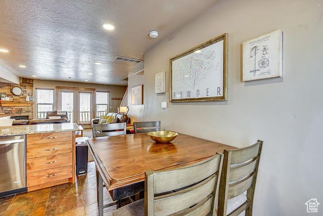 3518 N Moose Hollow Dr, Eden, UT 84310 - dining area with visible vents, recessed lighting, and a textured ceiling