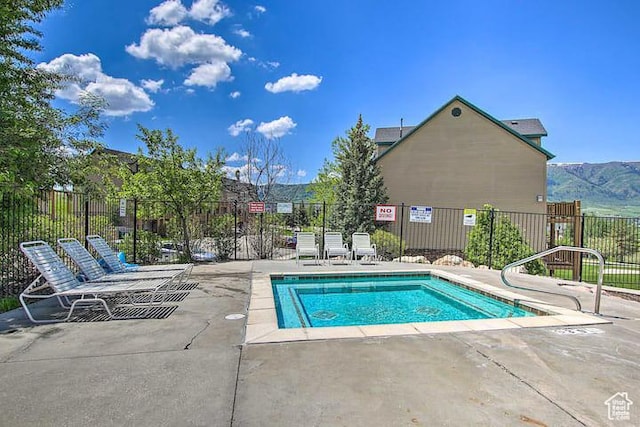 3518 N Moose Hollow Dr, Eden, UT 84310 - view of pool featuring a swimming pool, fence, and a patio