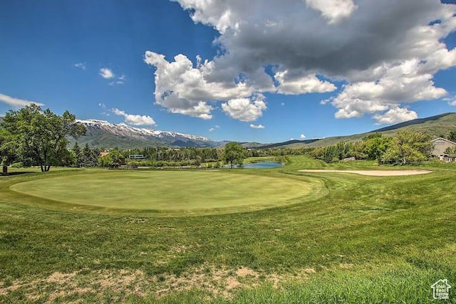 3518 N Moose Hollow Dr, Eden, UT 84310 - view of community with golf course view, a mountain view, and a yard