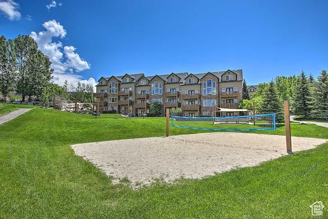 3518 N Moose Hollow Dr, Eden, UT 84310 - view of home's community with a lawn and volleyball court