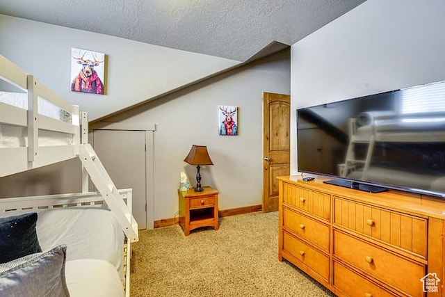 3518 N Moose Hollow Dr, Eden, UT 84310 - bedroom featuring light carpet, baseboards, and a textured ceiling