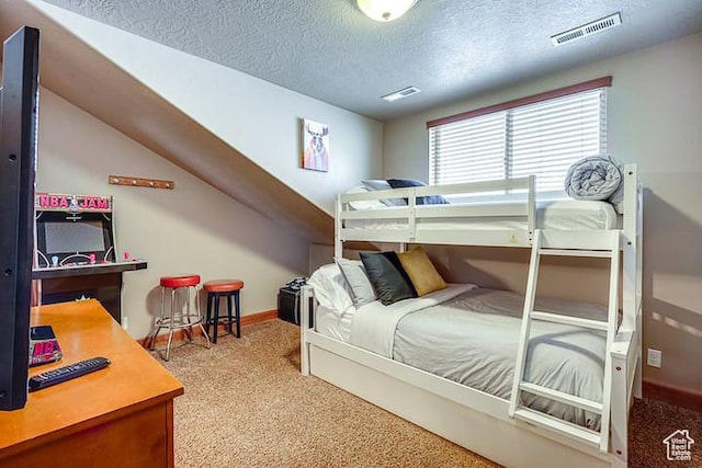 3518 N Moose Hollow Dr, Eden, UT 84310 - carpeted bedroom featuring baseboards, visible vents, and a textured ceiling