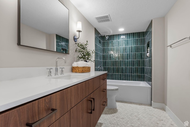 245 N Vine St W Unit 903, Salt Lake City, UT 84103 - bathroom featuring a textured ceiling, visible vents, washtub / shower combination, toilet, and vanity
