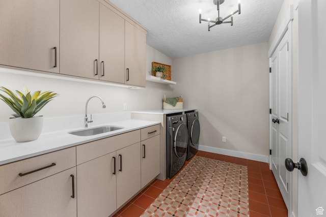 245 N Vine St W Unit 903, Salt Lake City, UT 84103 - washroom with cabinet space, a sink, tile patterned floors, and washer and dryer