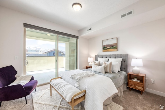 6169 Park S Unit 20, Park City, UT 84098 - carpeted bedroom featuring baseboards, visible vents, and access to outside