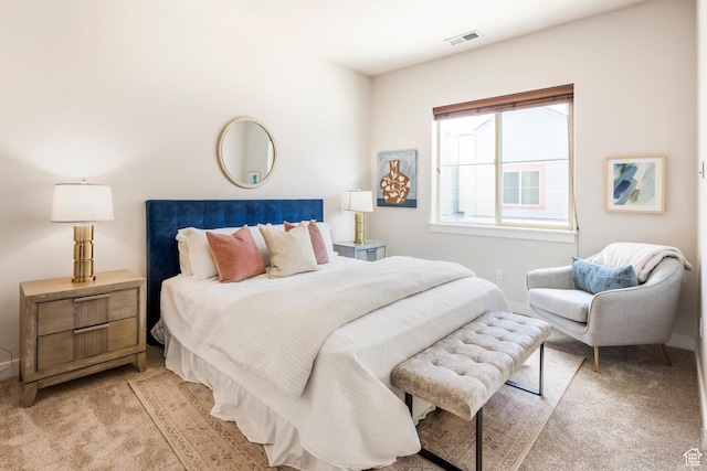 6169 Park S Unit 20, Park City, UT 84098 - bedroom with baseboards, visible vents, and light colored carpet