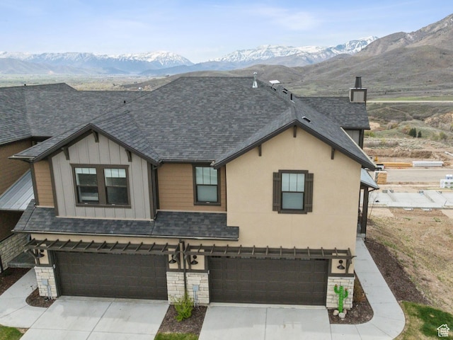 6065 N Westridge Rd, Heber City, UT 84032 - view of front of property with an attached garage, a shingled roof, and concrete driveway
