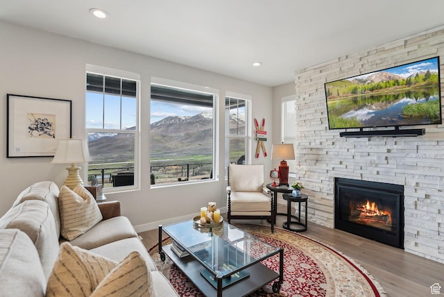 6065 N Westridge Rd, Heber City, UT 84032 - living area featuring recessed lighting, baseboards, wood finished floors, and a fireplace