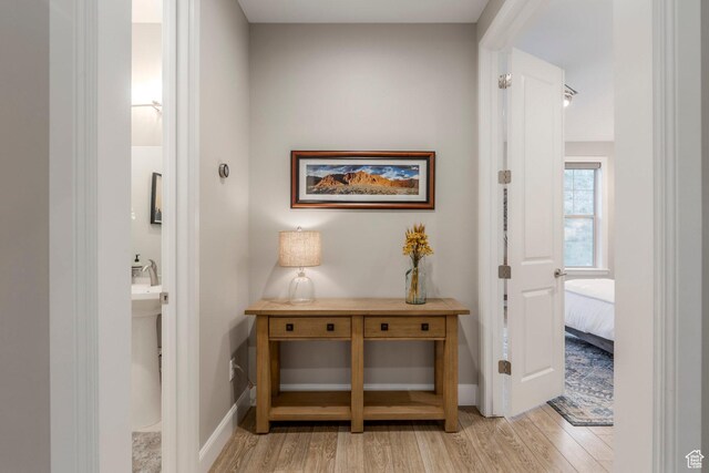 1089 W Cattail Ct, Kamas, UT 84036 - hallway featuring light wood-style floors and baseboards