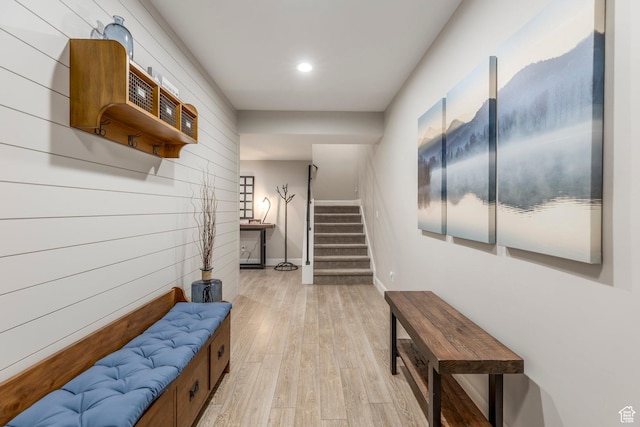 1089 W Cattail Ct, Kamas, UT 84036 - hallway with stairway, light wood finished floors, recessed lighting, baseboards, and wooden walls