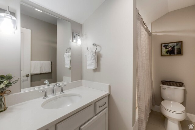 1089 W Cattail Ct, Kamas, UT 84036 - full bathroom with vaulted ceiling, vanity, toilet, and tile patterned floors
