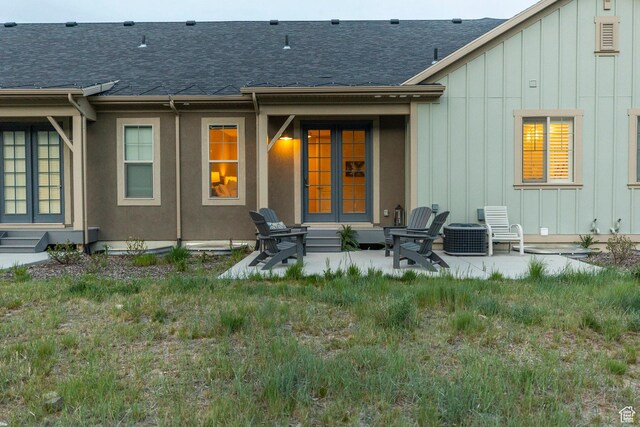 1089 W Cattail Ct, Kamas, UT 84036 - back of property featuring board and batten siding, roof with shingles, and entry steps