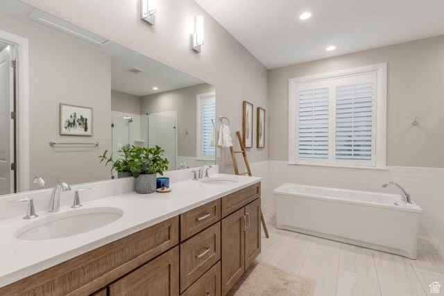 1089 W Cattail Ct, Kamas, UT 84036 - full bath with a stall shower, a bath, double vanity, recessed lighting, and a wainscoted wall