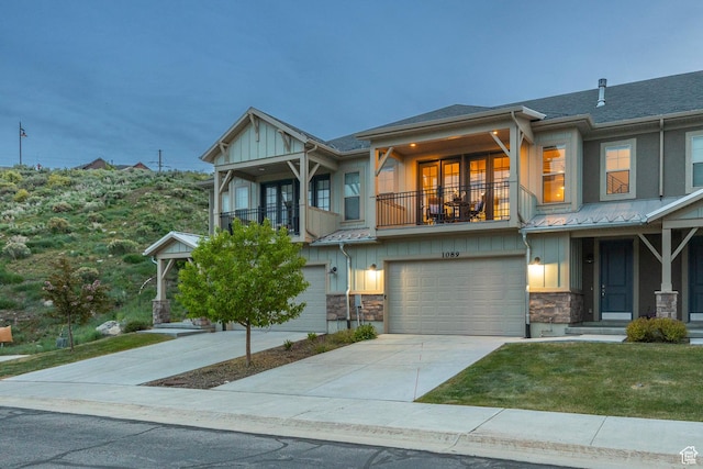 1089 W Cattail Ct, Kamas, UT 84036 - view of front of property featuring a balcony, board and batten siding, and stone siding