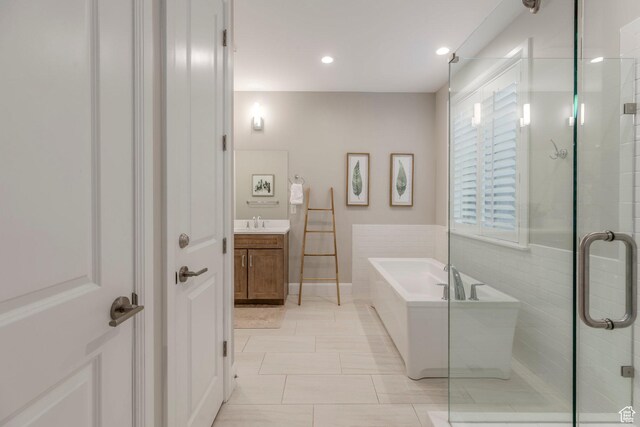 1089 W Cattail Ct, Kamas, UT 84036 - full bathroom with a tub, vanity, a stall shower, wainscoting, and recessed lighting