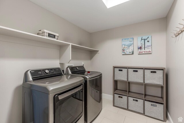 1089 W Cattail Ct, Kamas, UT 84036 - washroom featuring independent washer and dryer, light tile patterned floors, and baseboards