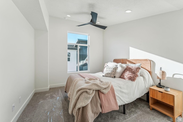bedroom with baseboards, recessed lighting, ceiling fan, and carpet