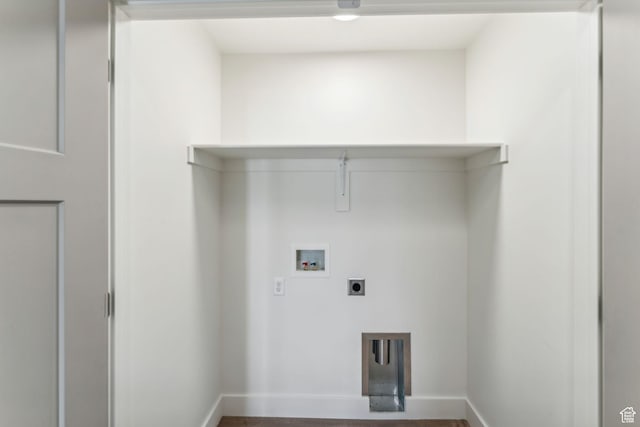 laundry room featuring hookup for a washing machine, baseboards, laundry area, and hookup for an electric dryer