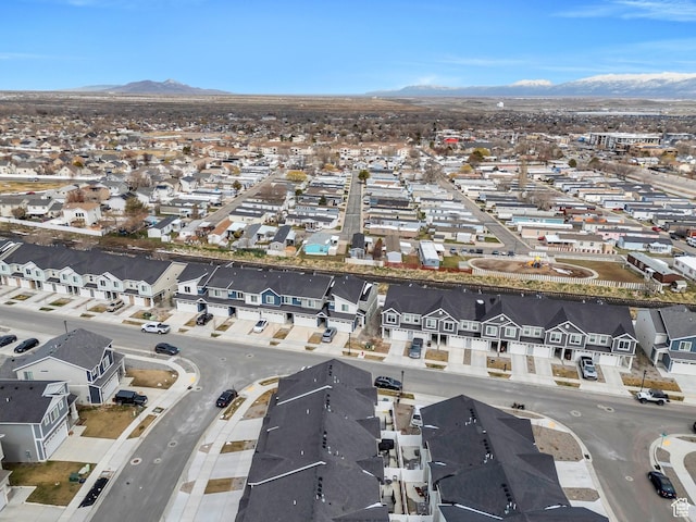 drone / aerial view with a residential view and a mountain view