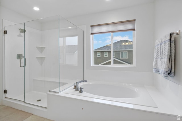 bathroom with a stall shower, tile patterned floors, recessed lighting, and a garden tub