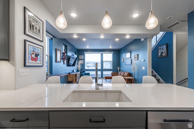 1376 Village Green Trl, Park City, UT 84098 - kitchen with open floor plan, stainless steel dishwasher, a sink, and gray cabinets