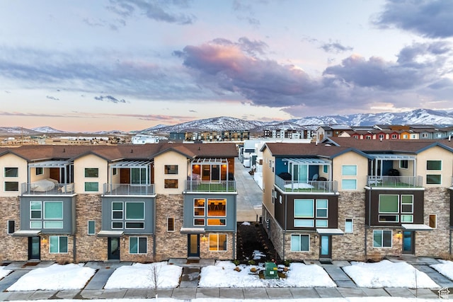 1376 Village Green Trl, Park City, UT 84098 - view of property with stone siding, a residential view, a mountain view, and stucco siding