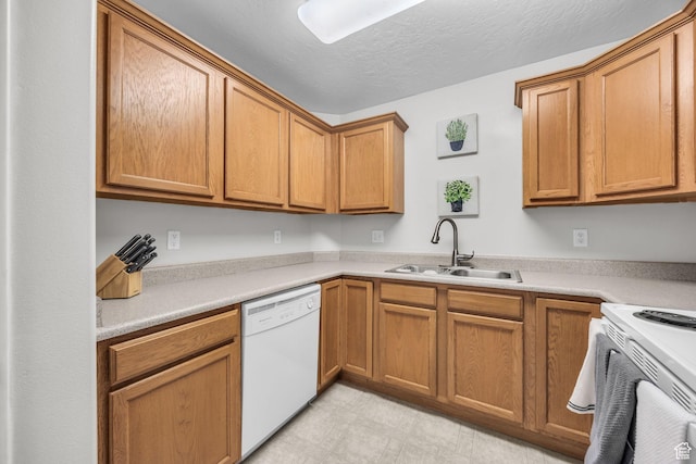 1598 Westbury Way Unit H, Lehi, UT 84043 - kitchen with light countertops, a sink, light floors, a textured ceiling, and white appliances