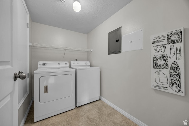1598 Westbury Way Unit H, Lehi, UT 84043 - washroom with baseboards, a textured ceiling, washing machine and dryer, laundry area, and electric panel