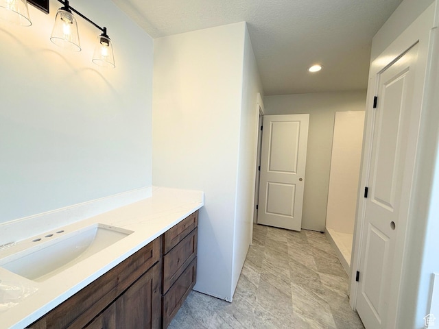572 S Windy Ridge Dr E Unit 1207, Smithfield, UT 84335 - bathroom featuring recessed lighting, vanity, and baseboards