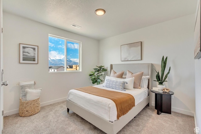 2398 E Cinder Ln, Eagle Mountain, UT 84005 - bedroom featuring light carpet, baseboards, and visible vents