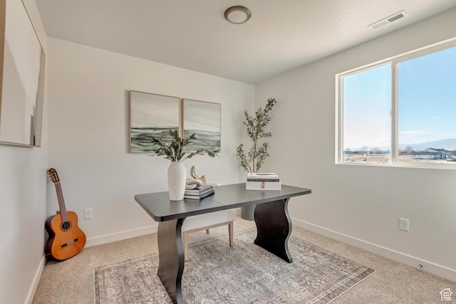 2398 E Cinder Ln, Eagle Mountain, UT 84005 - office area with baseboards, light colored carpet, and visible vents