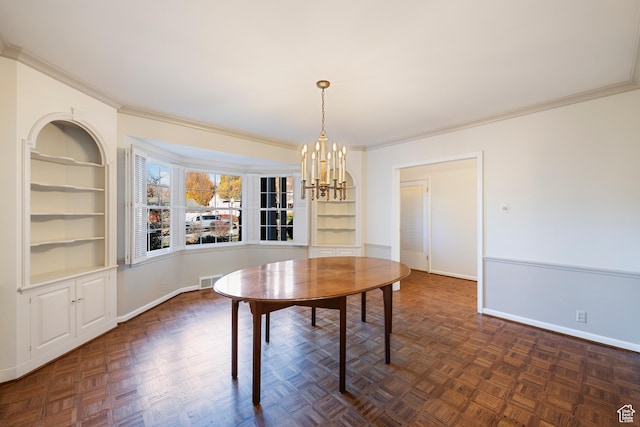 2532 E Maywood Dr, Salt Lake City, UT 84109 - unfurnished dining area with visible vents, a chandelier, baseboards, ornamental molding, and built in shelves