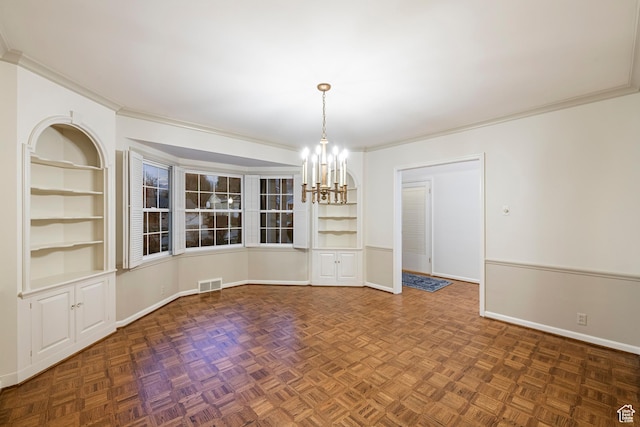 2532 E Maywood Dr, Salt Lake City, UT 84109 - unfurnished dining area featuring visible vents, crown molding, baseboards, built in shelves, and an inviting chandelier