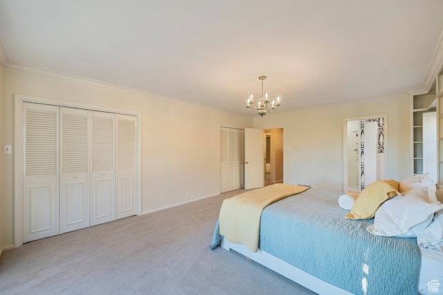 2532 E Maywood Dr, Salt Lake City, UT 84109 - bedroom with multiple closets, carpet, baseboards, ornamental molding, and a notable chandelier