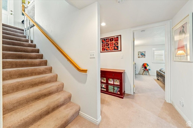 180 N 1100 E Unit 24, Washington, UT 84780 - stairway featuring baseboards and carpet floors