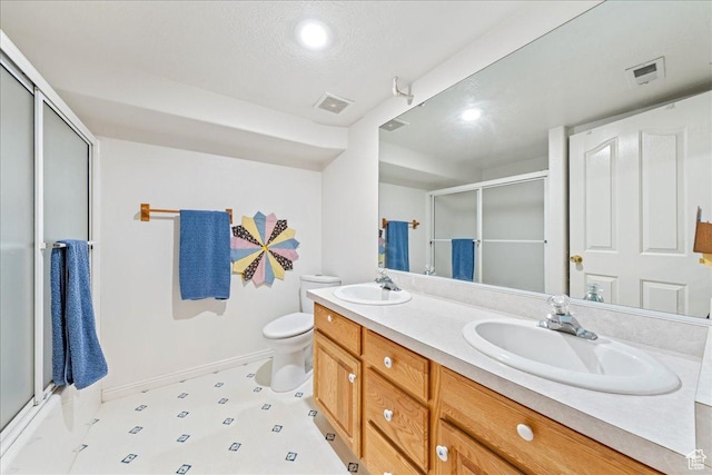 180 N 1100 E Unit 24, Washington, UT 84780 - bathroom featuring a stall shower, visible vents, and a sink