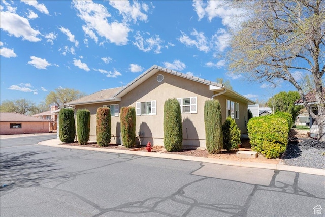 180 N 1100 E Unit 24, Washington, UT 84780 - view of front of property featuring stucco siding