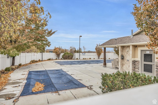 5116 W Rock Butte Rd, Herriman, UT 84096 - view of swimming pool with a fenced backyard, a fenced in pool, and a patio