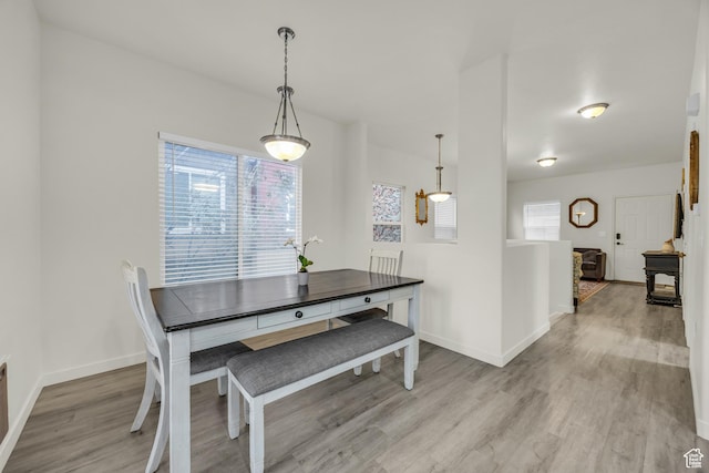 5116 W Rock Butte Rd, Herriman, UT 84096 - dining space featuring baseboards and light wood-type flooring