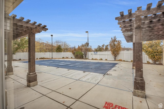5116 W Rock Butte Rd, Herriman, UT 84096 - view of pool featuring a fenced backyard, a pergola, and a patio