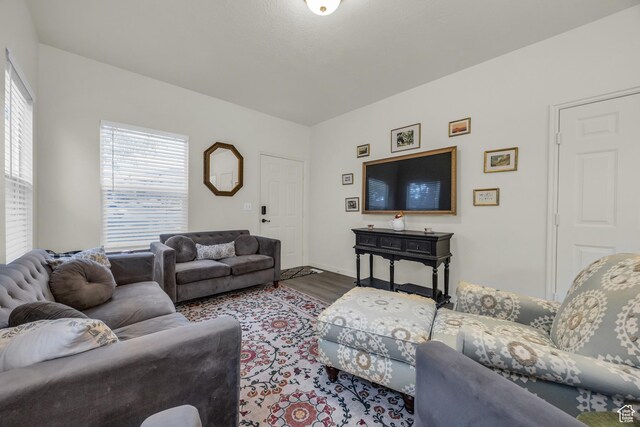 5116 W Rock Butte Rd, Herriman, UT 84096 - living room featuring baseboards and wood finished floors