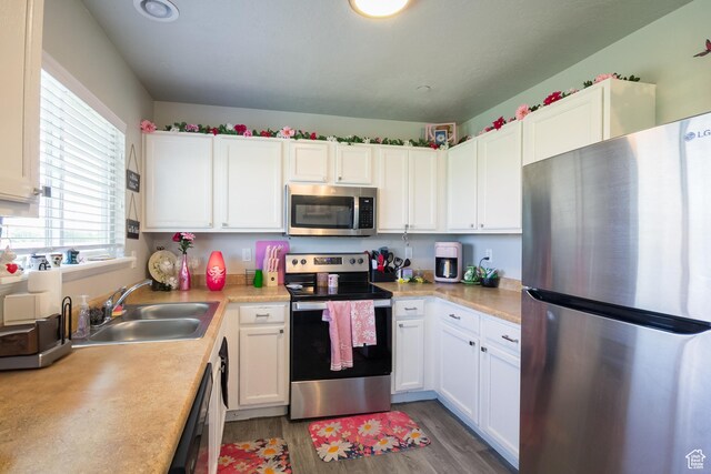 669 E 1375 S, Vernal, UT 84078 - kitchen with stainless steel appliances, a sink, light countertops, and white cabinets