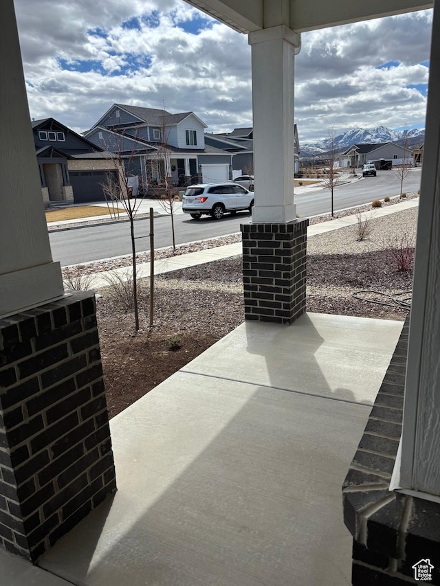12038 S Middle Teton Dr Unit 134, Herriman, UT 84096 - porch featuring a residential view