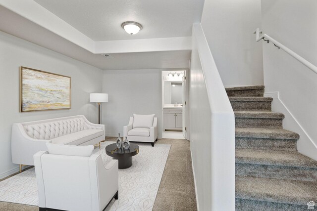 4988 W Currant Dr, South Jordan, UT 84009 - living room with carpet floors, stairs, and baseboards