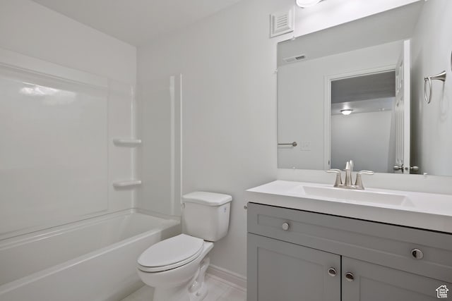 4988 W Currant Dr, South Jordan, UT 84009 - bathroom with vanity, toilet, washtub / shower combination, tile patterned floors, and baseboards