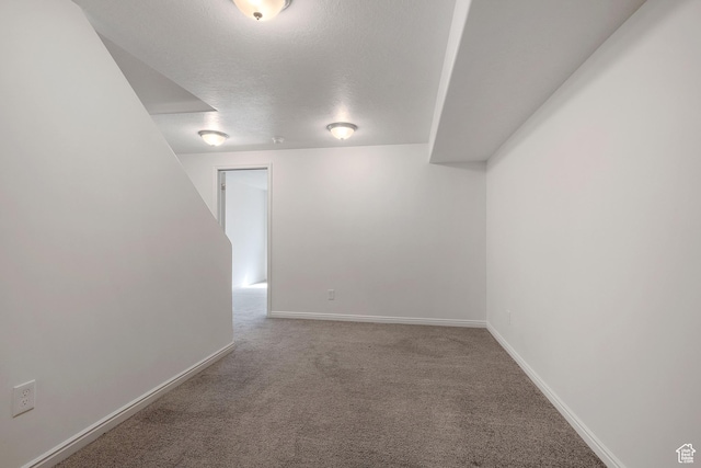 4988 W Currant Dr, South Jordan, UT 84009 - spare room featuring carpet, a textured ceiling, and baseboards
