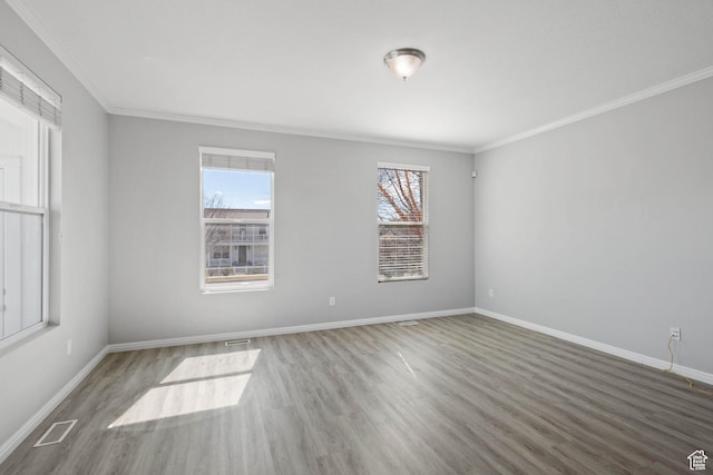 4988 W Currant Dr, South Jordan, UT 84009 - spare room with crown molding, wood finished floors, and baseboards
