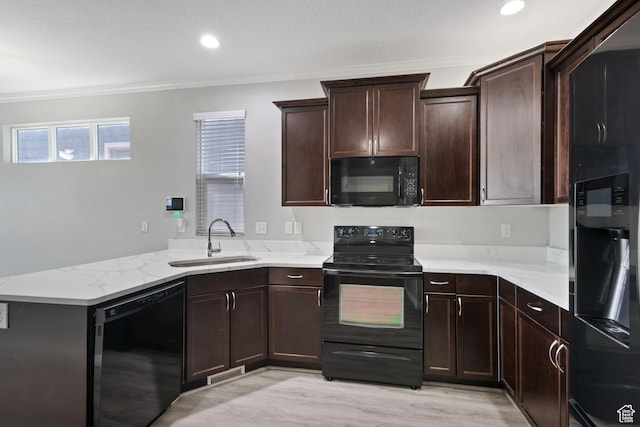 4988 W Currant Dr, South Jordan, UT 84009 - kitchen featuring black appliances, a sink, ornamental molding, a peninsula, and light stone countertops