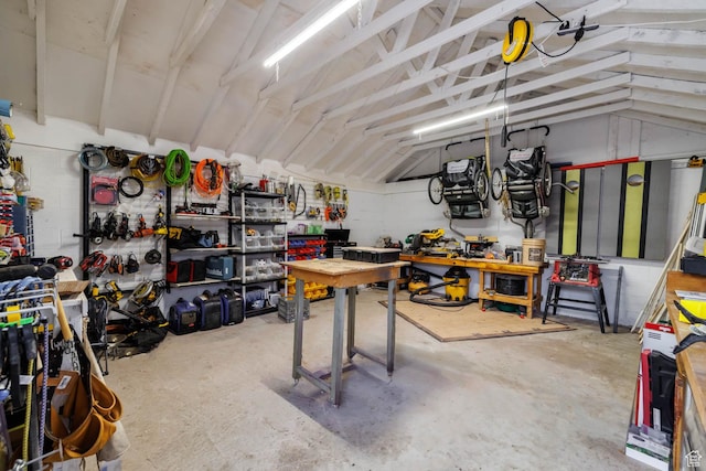 garage with a workshop area