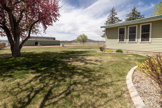 view of yard with fence